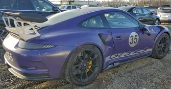 Пошкоджений Porsche 911 GT3 RS у фіолетовому кольорі виставили на аукціон