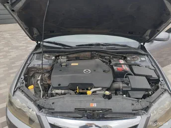 Mazda Persona 2001