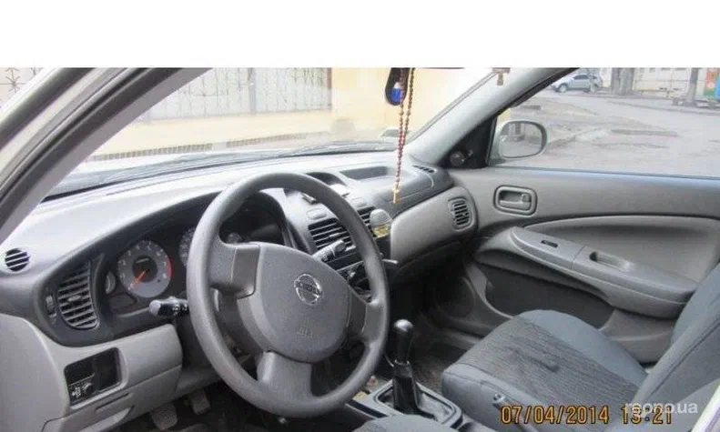 Nissan Almera 2010 - 4