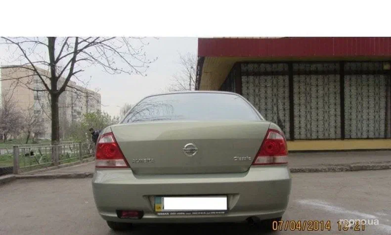 Nissan Almera 2010 - 5