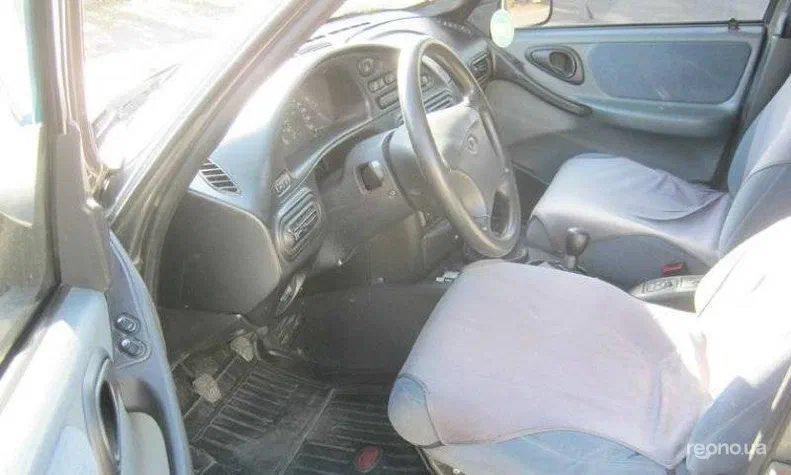 Chevrolet Niva 2004 - 12