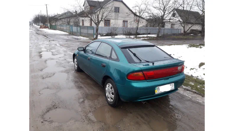 Mazda 323 1996 - 7