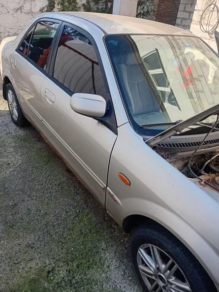 Mazda 323 2003 - 1