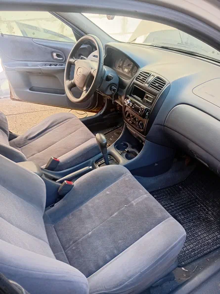 Mazda 323 2003 - 6