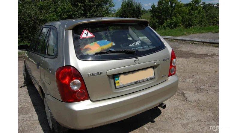 Mazda 323 2003 - 6
