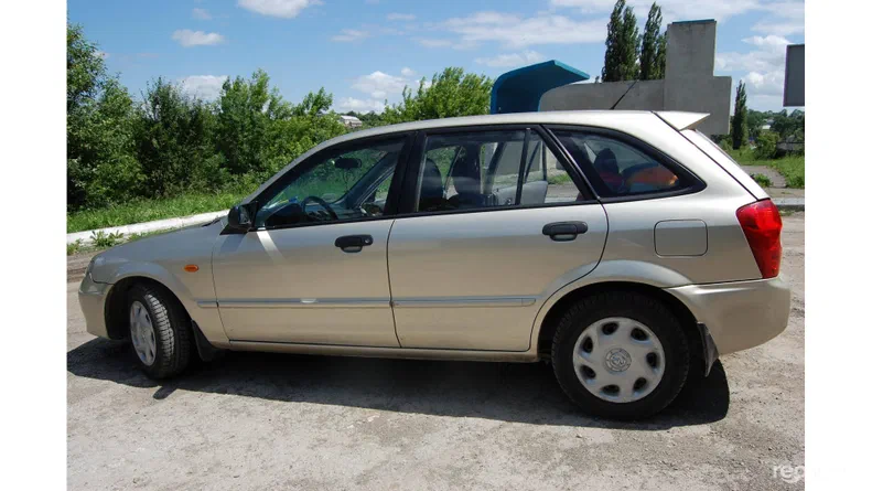 Mazda 323 2003 - 5