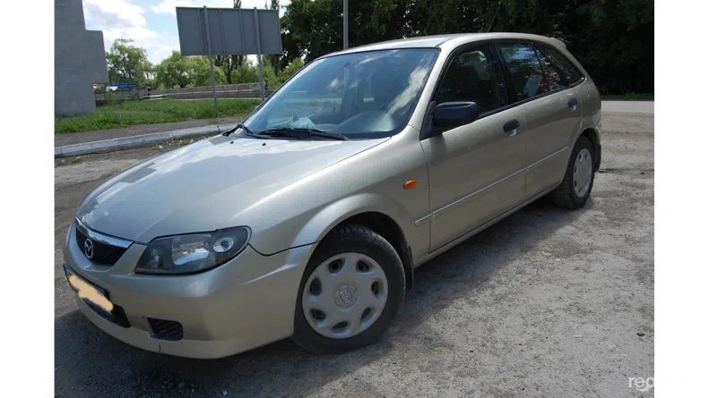 Mazda 323 2003 - 9