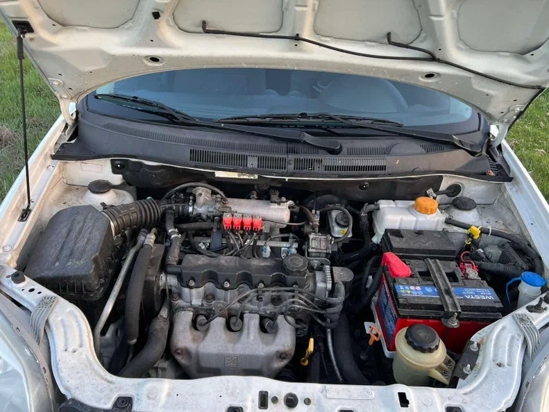 Chevrolet Aveo 2011 - 13