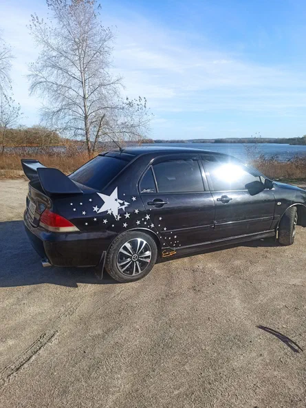 Mitsubishi Lancer 2006 - 7