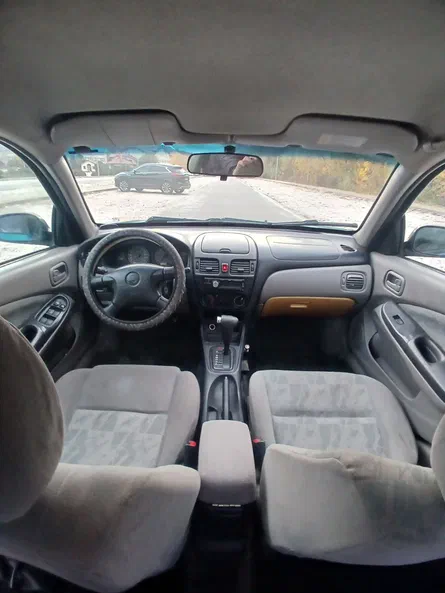 Nissan Almera 2001 - 9