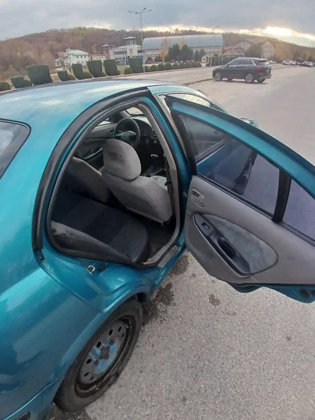 Nissan Almera 2001 - 7