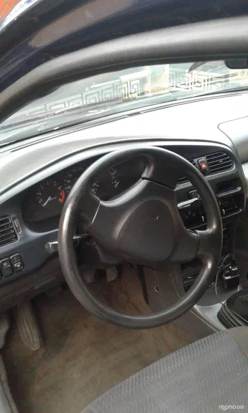 Mazda 323 1995 - 7