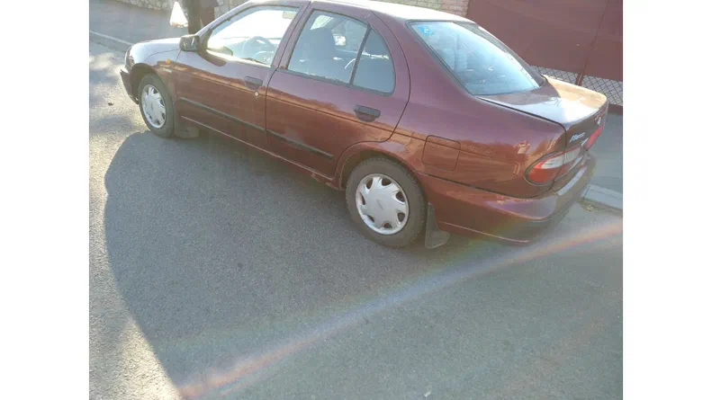 Nissan Almera 1998 - 13