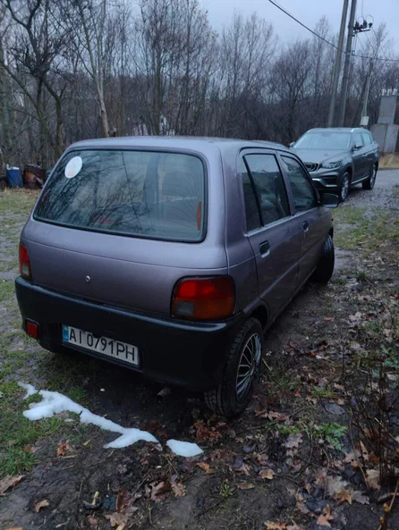 Daihatsu Cuore 1997 - 5