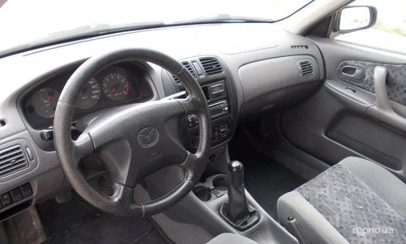 Mazda 323 1999 - 0