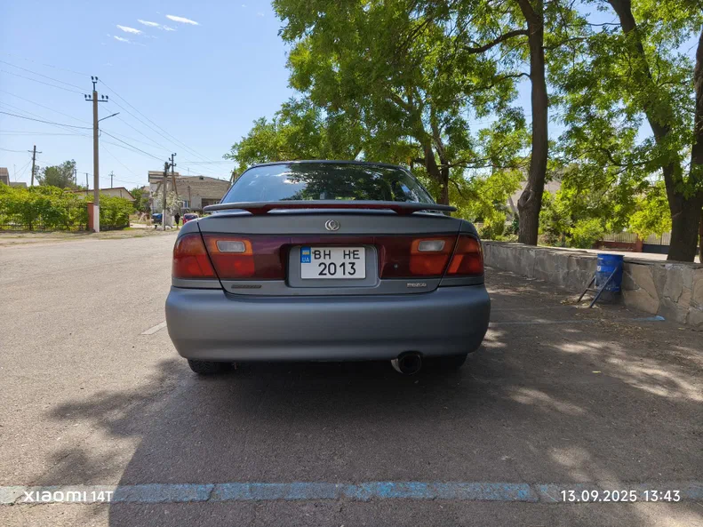 Mazda 323 1996 - 7