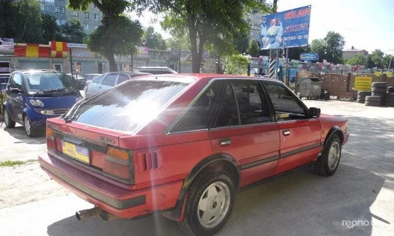 Nissan Bluebird 2011 - 4