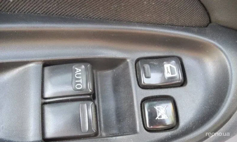 Nissan Almera 2005 - 13