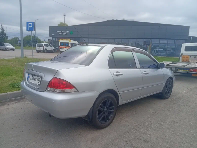 Mitsubishi Lancer 2011 - 13
