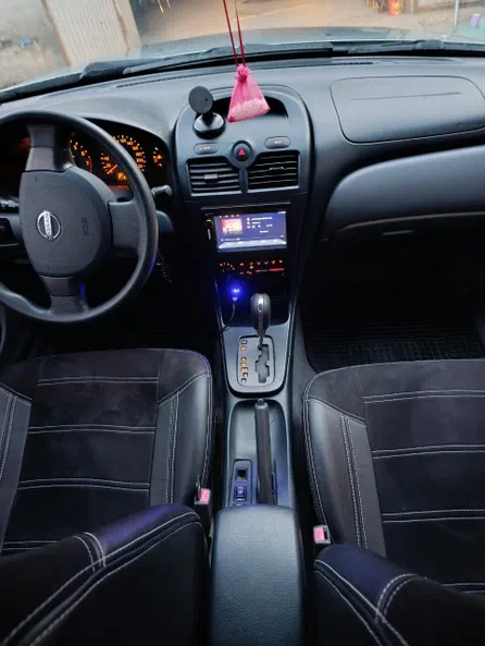 Nissan Almera 2006 - 5