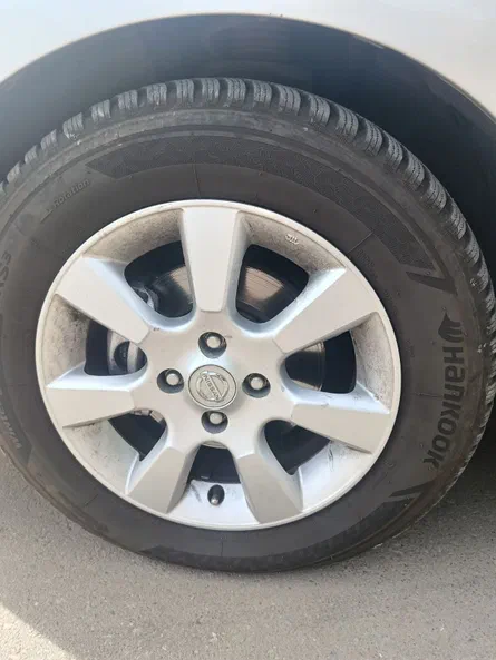 Nissan Tiida 2009 - 11