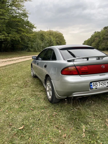 Mazda 323 1998 - 9