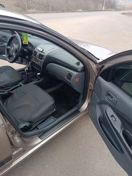 Nissan Almera 2006 - 6